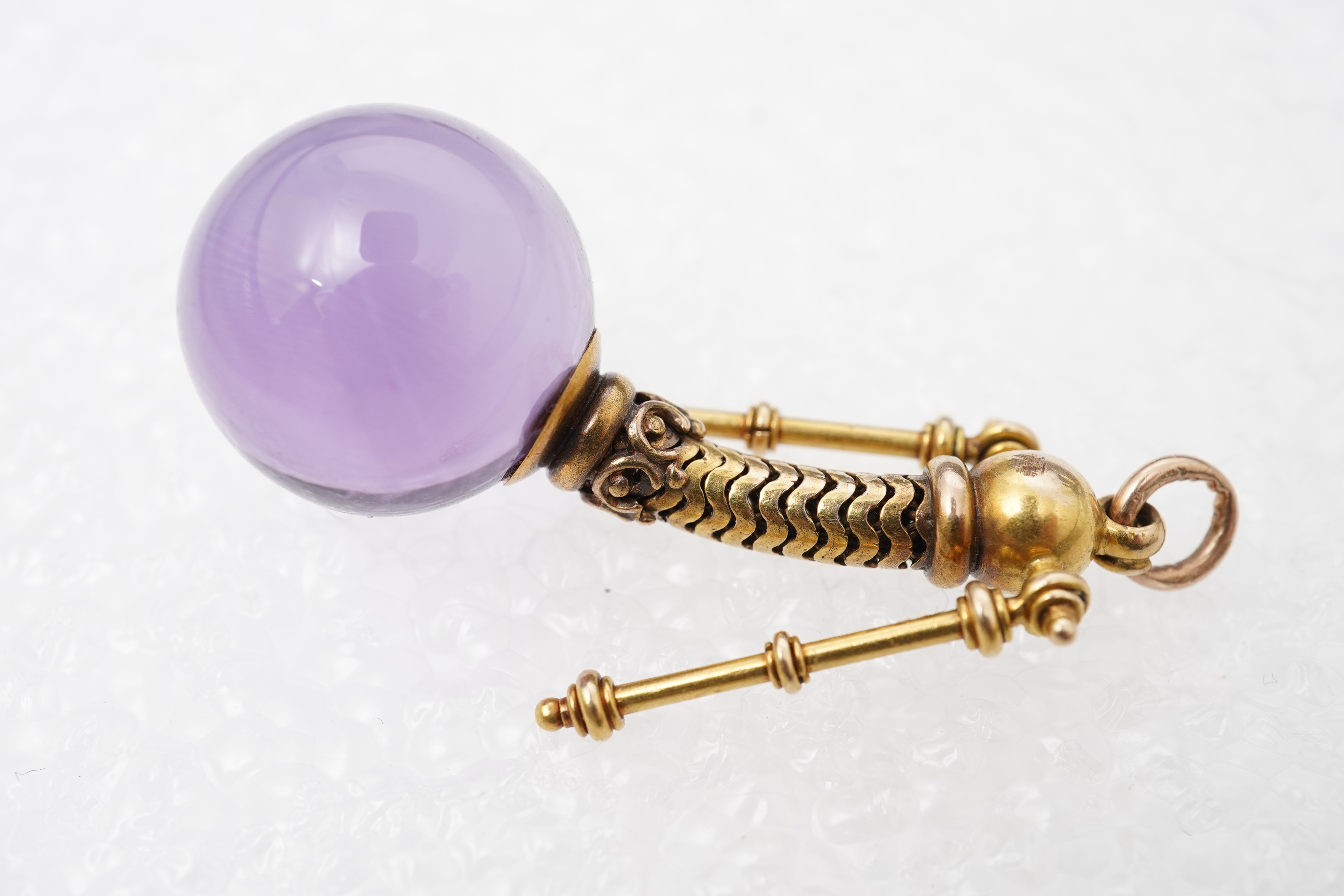 An unusual Victorian gold and amethyst pendant, mid 19th century